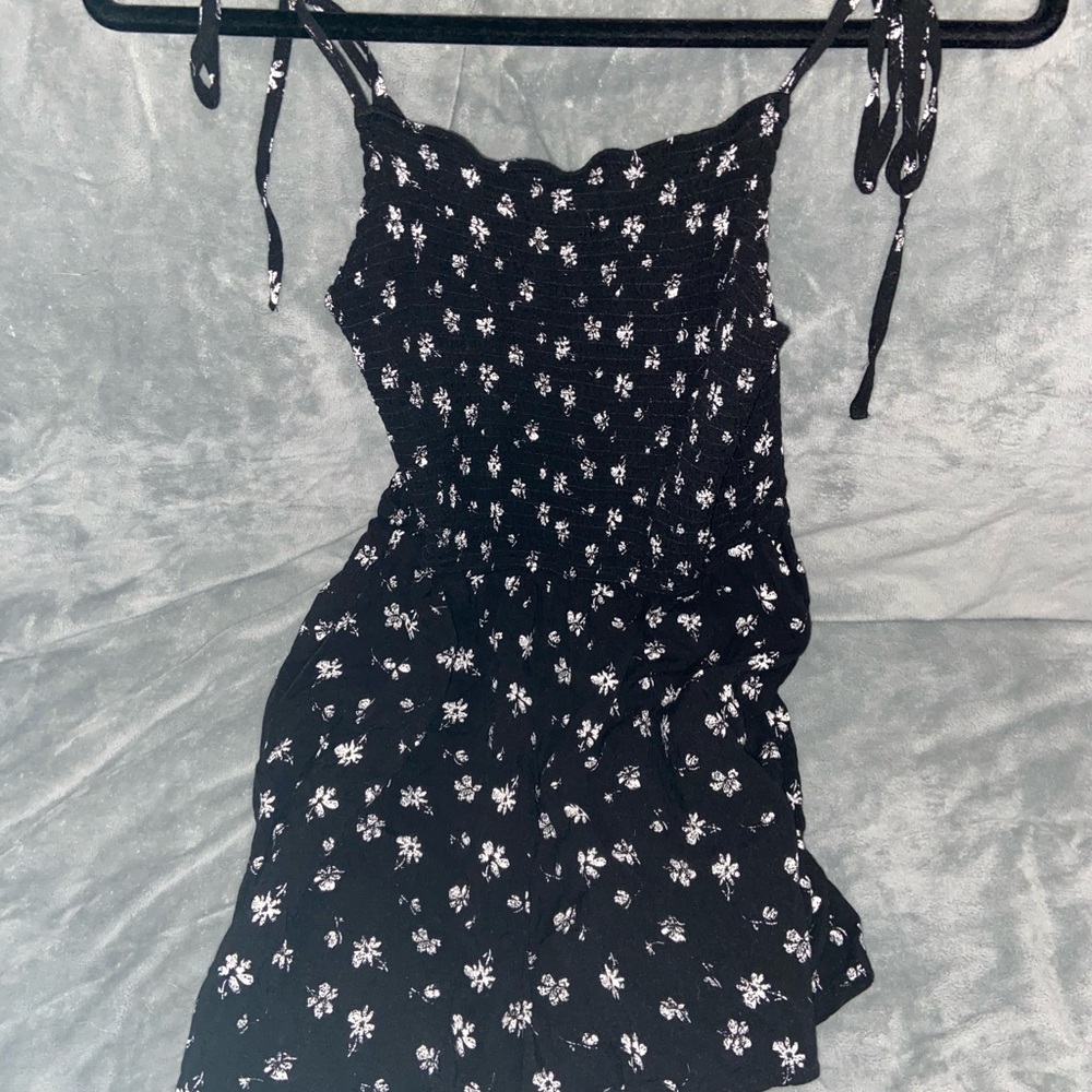 Black Romper with White Floral Pattern